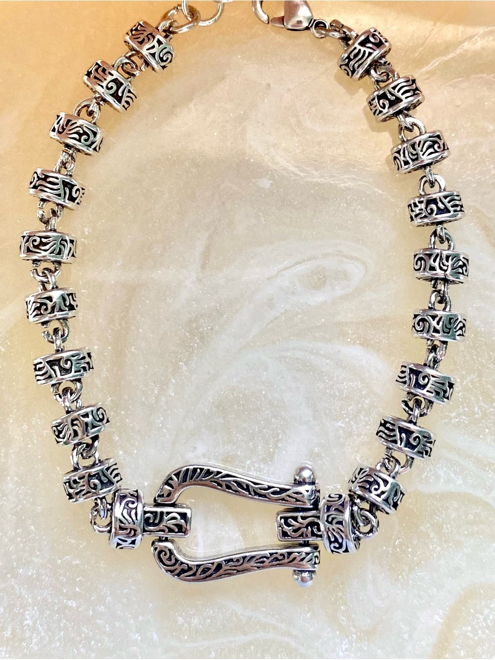 Intricate Silver-Tone Bracelet with Scrollwork Barrel Beads
